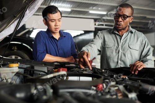 Preview: Car Owner Listening to Mechanic