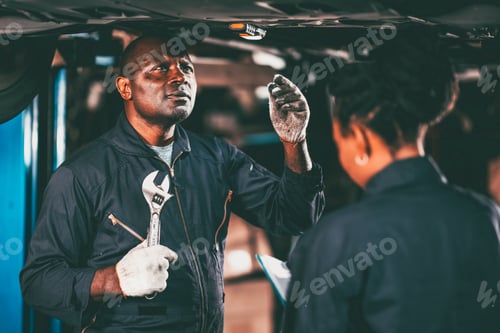 Preview: garage mechanic team working car auto service black african people professional worker together