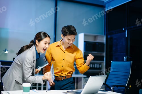 Preview: Asian business colleagues celebrating success in modern office, teamwork achievement,