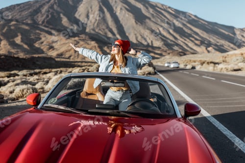Preview: Woman traveling by car on the volcanic valley