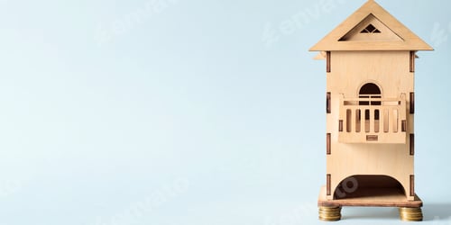 Preview: Wooden House on Coins Against White Background