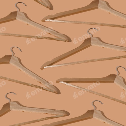 Preview: Pattern hangers for clothes. Hanger set. Beige background copy space banner. Wooden hangers. Store