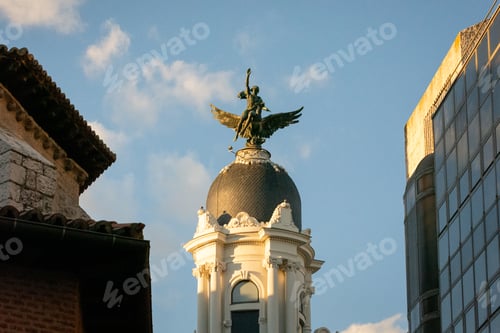 Preview: Statue on the dome of La Union and the Fenix, Calle de Santiago. Castile and Leon, Spain