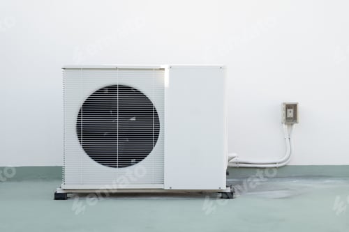 Preview: Air conditioner compressor installed on the roof of a building.