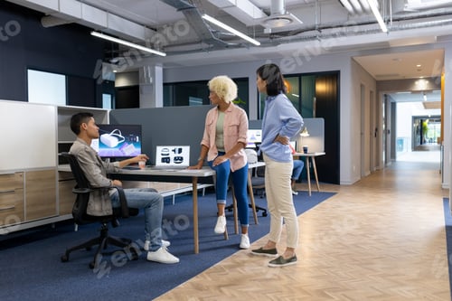 Preview: In modern office, diverse young team analyzing VR graphs