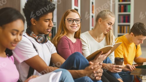 Preview: International classmates preparing for exams at library