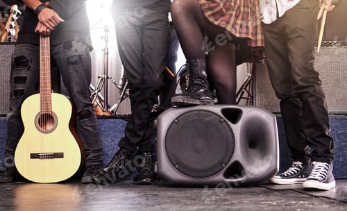 Preview: Ready to play. Cropped shot of an unrecognizable band standing on stage before their gig.