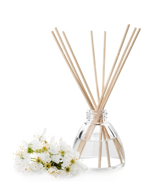 Preview: Aromatic reed freshener and flowers on white background