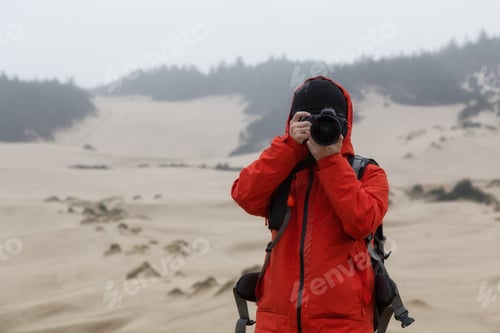 Preview: Photographer taking pictures of the landscape