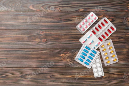 Preview: Protective face masks or surgical masks, medicine pills and thermometer