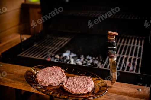 Preview: Raw Burger Patties Prepared for Grilling
