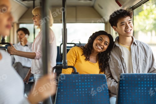 Preview: Happy smiling guy and lady taking bus together