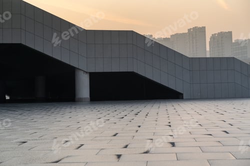 Preview: Modern architecture with geometric patterns at dusk.