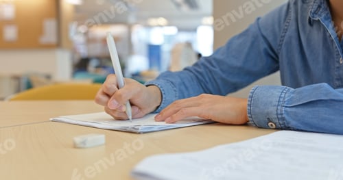 Preview: Woman do her homework at library