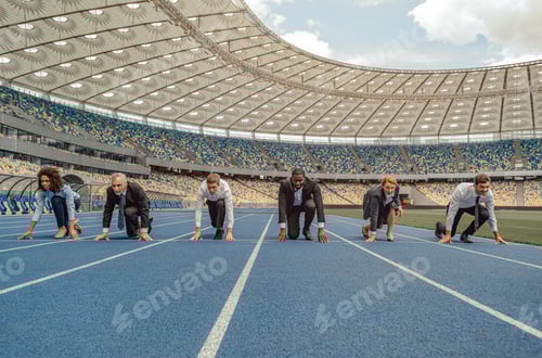 Preview: Front view photo of business team standing on race track
