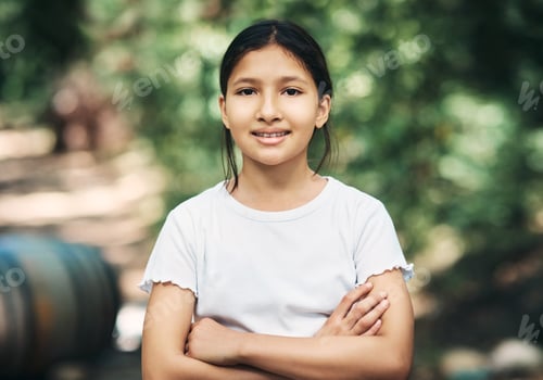 Preview: Portrait of a confident teenage girl having fun at summer camp