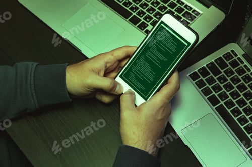 Preview: Close up of programmer of hacker hands typing a code