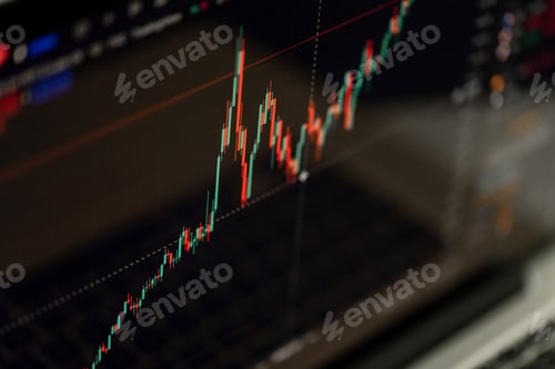 Preview: Trading chart displayed on the screen of the laptop. Stock market, trend line in a candlestick form.