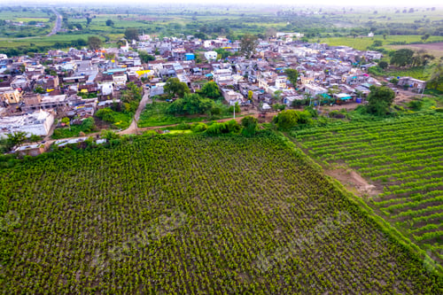 Preview: Aerial view of village and agriculture field, India.