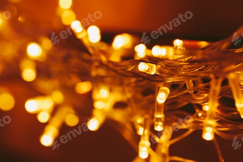 Preview: Bokeh light of holiday garland close up