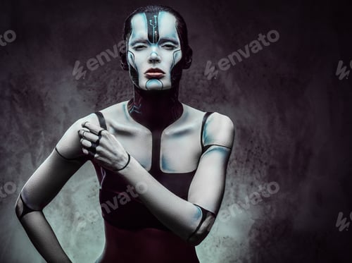 Preview: Sensual cyber woman. Technology and future concept. Isolated on a dark textured background.
