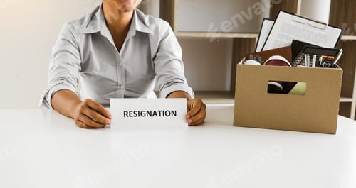 Preview: Female employee is about to submit a resignation at his office.