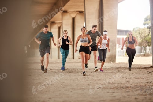 Preview: Group of runners training outdoors