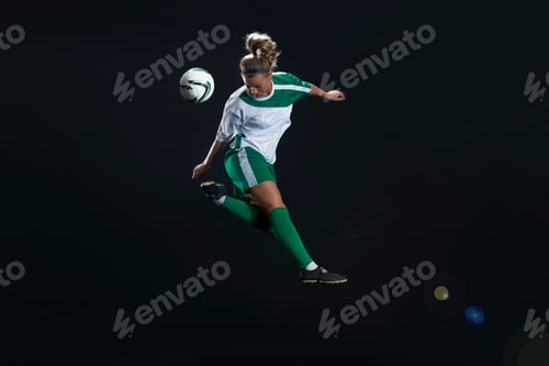 Preview: Footballer kicking ball