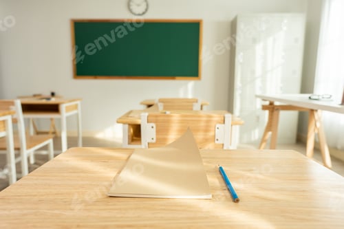 Preview: Shot of empty classroom with chairs under desks in elementary school.