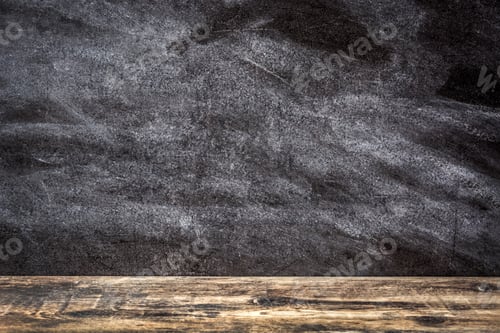 Preview: Empty wooden table with chalkboard background for displaying products