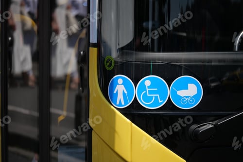 Preview: Accessibility symbols displayed on a city bus front