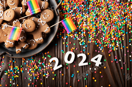 Preview: New year background of tray with gingerbread cookie men, rainbow flags and color sprinkles