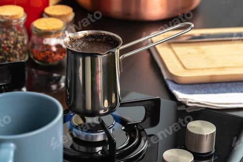 Preview: Brew coffee in a steel turk on a gas stove