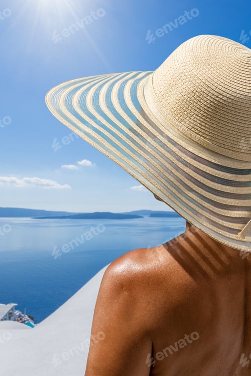 Preview: Woman on holidays in Santorini island