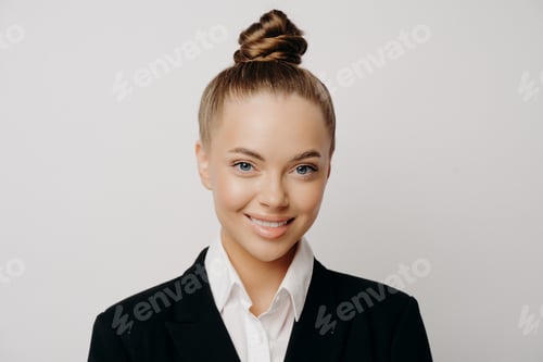 Preview: Professional Woman in Business Attire Smiling Confidently