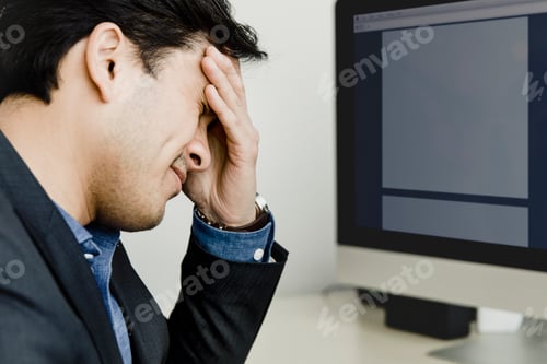 Preview: Stressed businessman