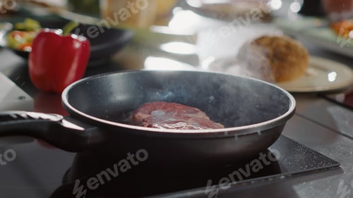 Preview: Beef meat cooked with organic sunflower oil in frying pan