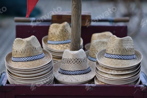 Preview: Number of straw hats in a store for sale