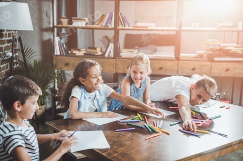 Preview: multiethnic group of happy children drawing pictures together at home