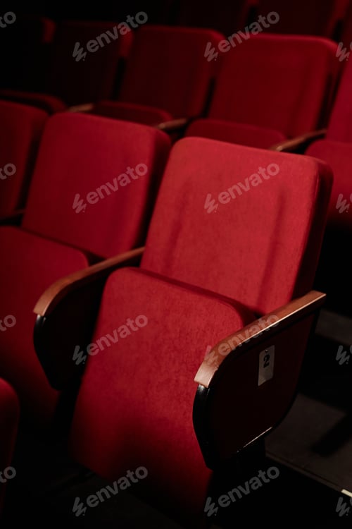 Preview: Folding Red Chair in Audience