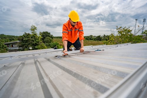 Preview: skilled technician adjusts a solar panel on rooftop