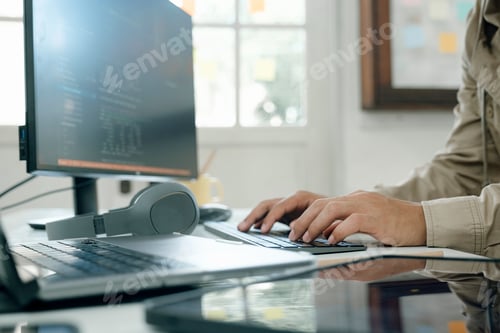 Preview: Computer programmer developing software application