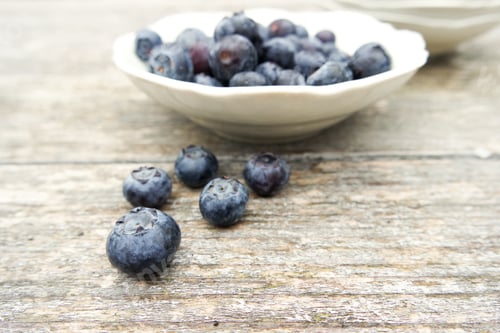 Preview: Blueberries in Bowl on Wood Table
