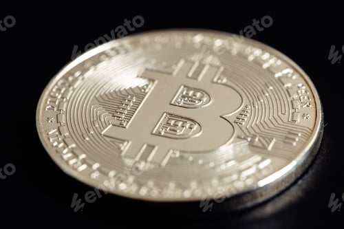 Preview: Bitcoin on black background. Cryptocurrency trading. Macro photo