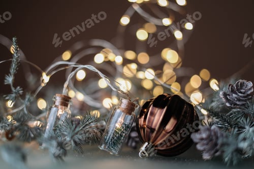 Preview: Christmas ball on brown background with bokeh lights
