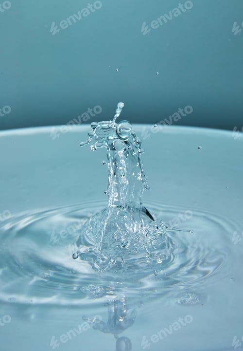 Preview: Abstract background of splash of color water, collision of colored drops, the concept