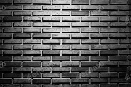 Preview: Abstract background from black brick pattern wall with light and shadow. Dramatic backdrop.
