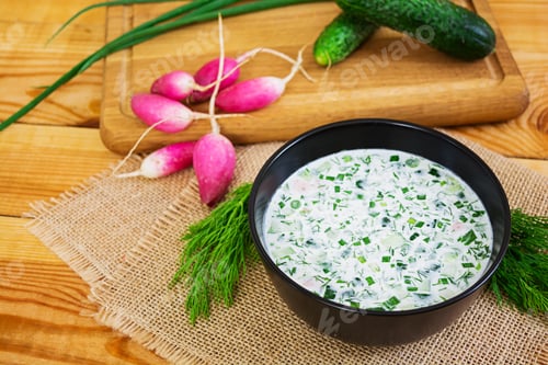 Preview: Cold soup okroshka on wooden background