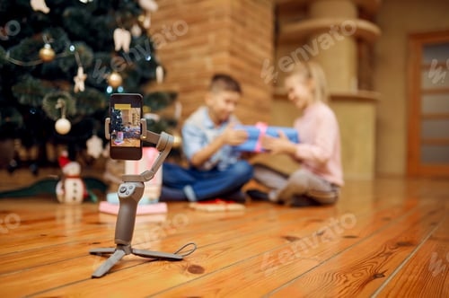 Preview: Children bloggers records vlog at christmas tree