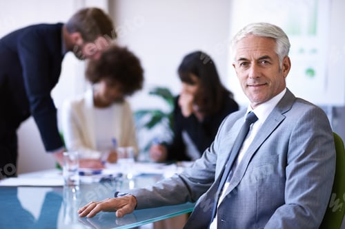 Preview: Cropped shot of a group of business colleagues meeting in the boardroom